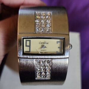 Silver watch with Minimalist Display and Rhinestone Accents